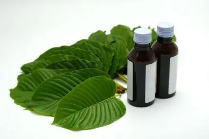 Mitragynine. kratom and Cough medicine on white background