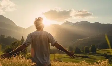 Person standing in front of sunlight