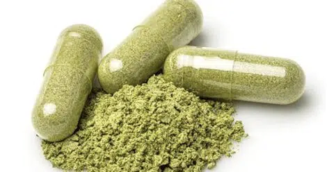 3 herbal supplement capsules with powder