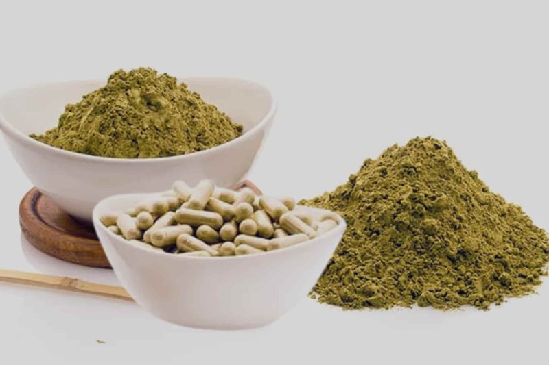 Green Borneo Kratom capsules and powder offered by Golden Monk.